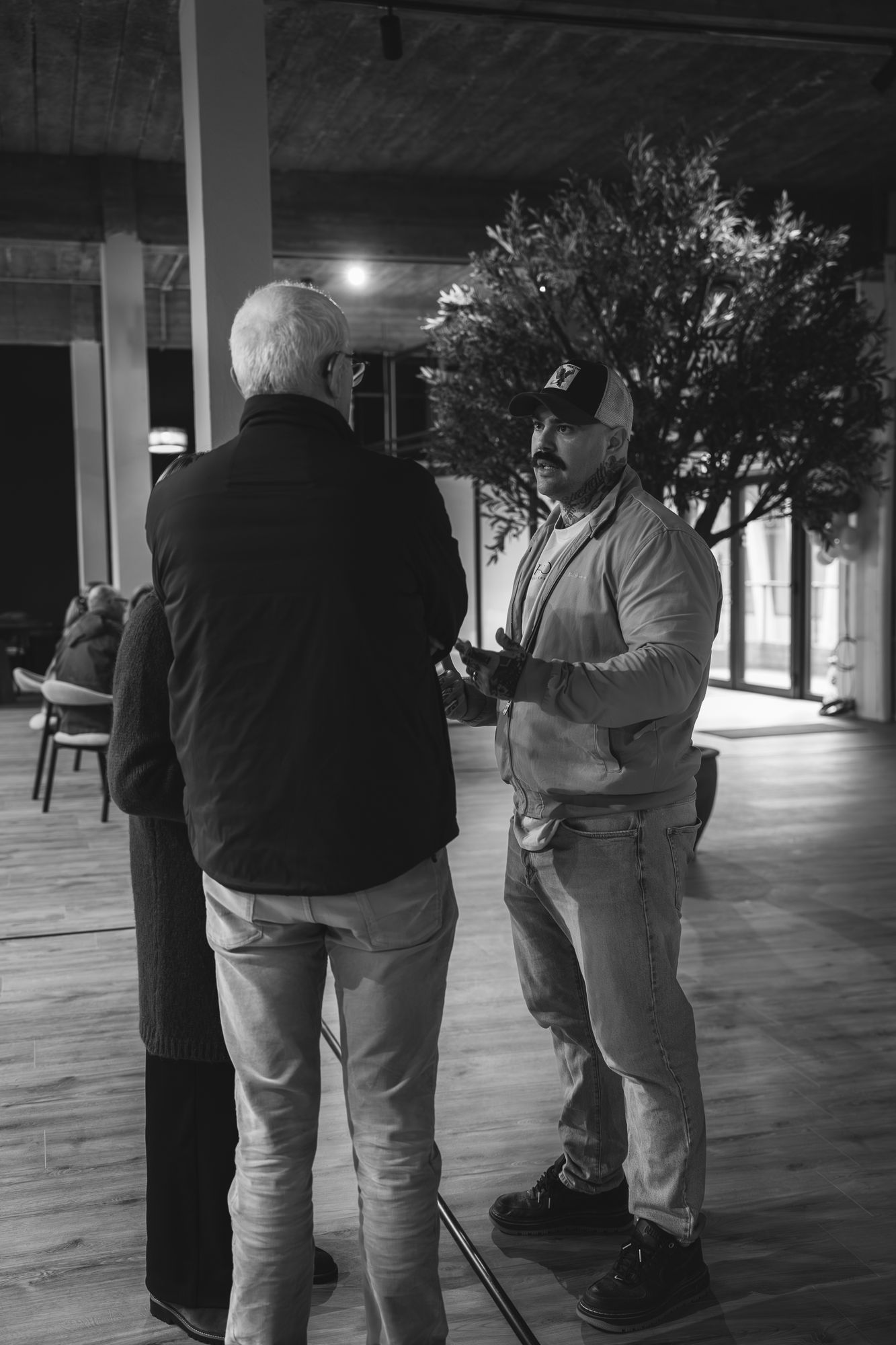 Coach in gesprek met een lid